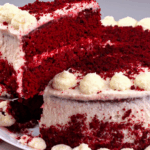 classic red velvet cake recipe sliced on plate