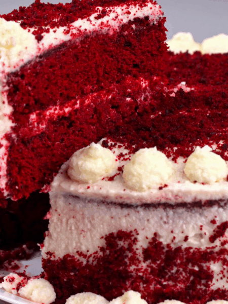 classic red velvet cake recipe sliced on plate