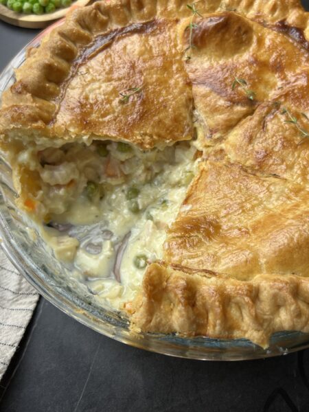 homemade chicken pot pie serving on table